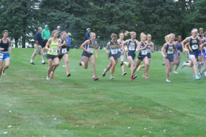 DSU's Lady Trojans running in the rain during the Herb Blakely Invitational 