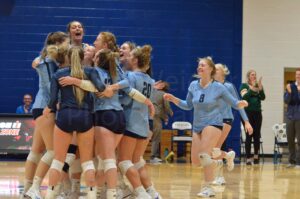 volleyball team celebrates win