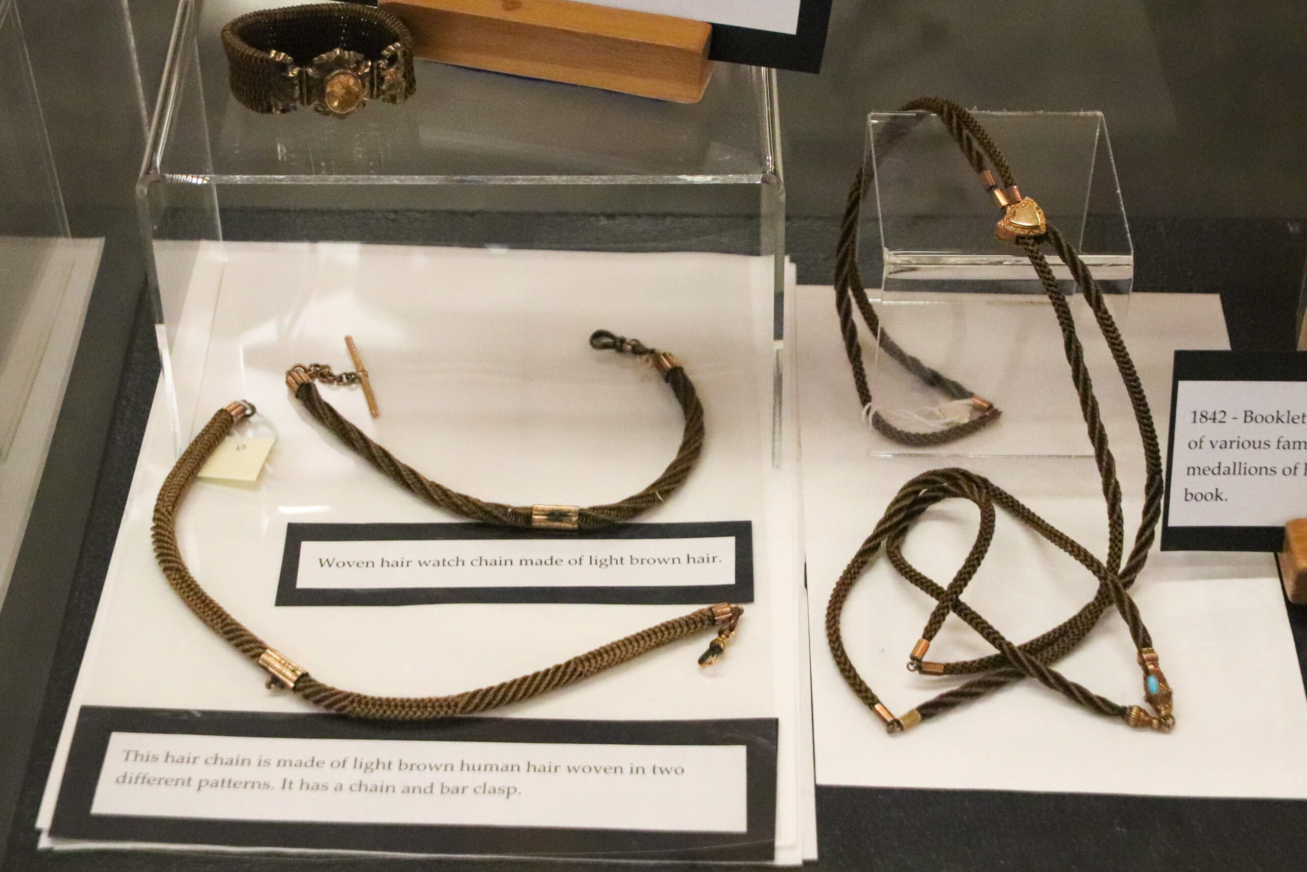 Jewelry made from hair on display